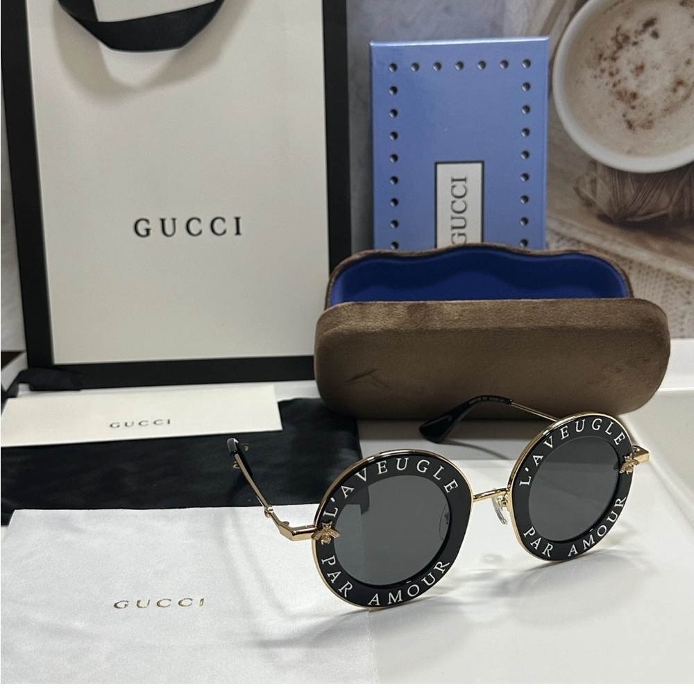 Gucci Black and Gold Round Sunglasses